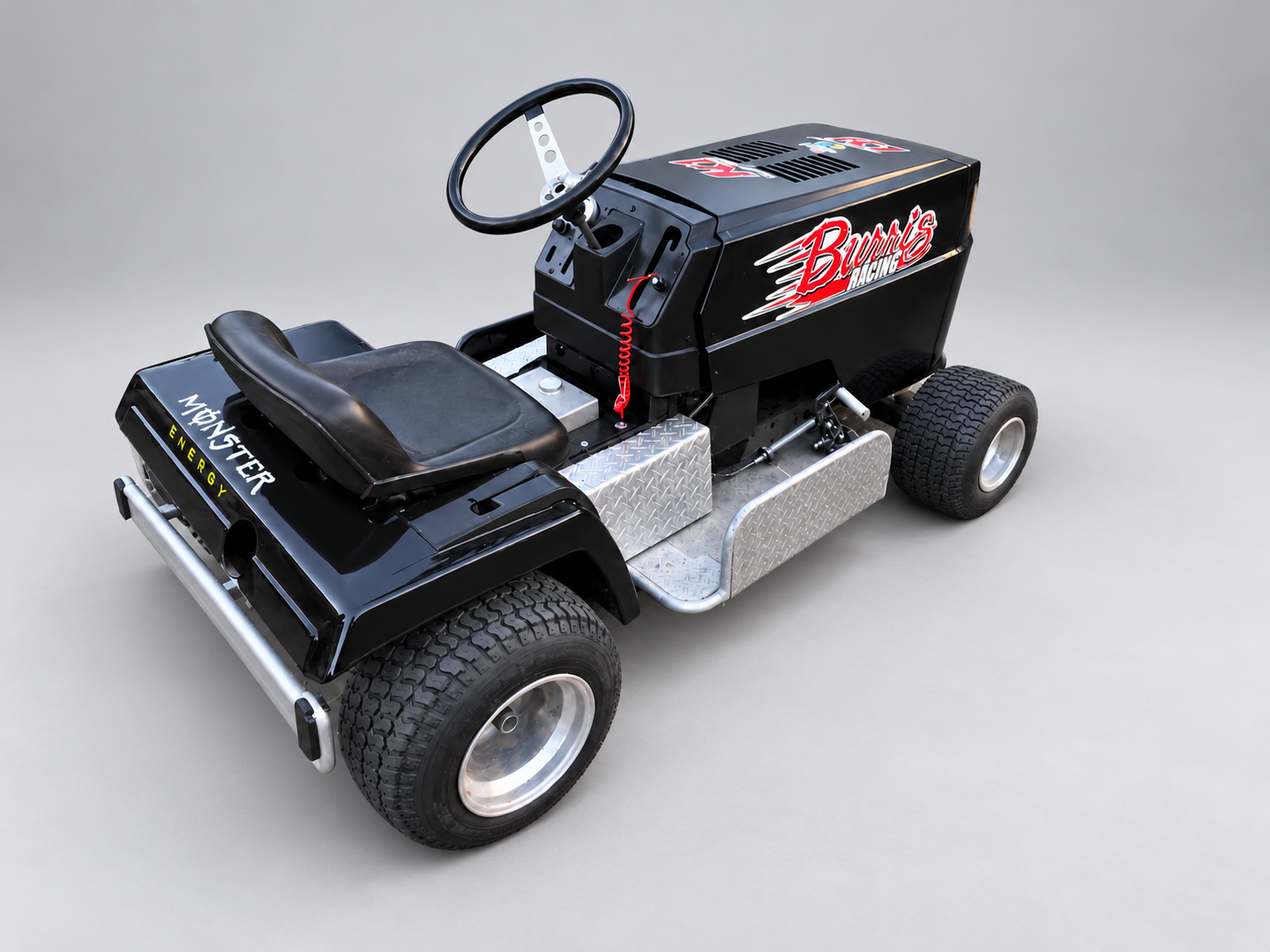Black racing mower — Alternate studio view